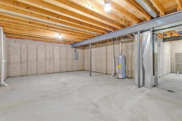 basement with gas water heater and electric panel