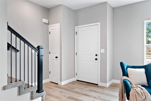 entrance foyer featuring light wood-type flooring