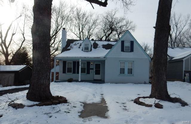 view of new england style home