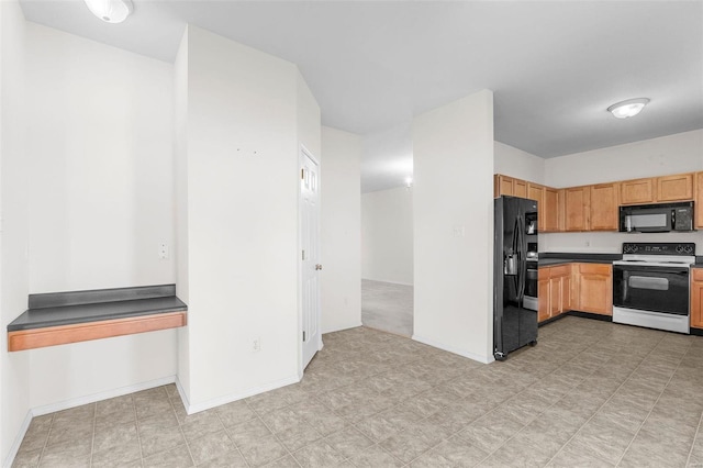 kitchen with black appliances