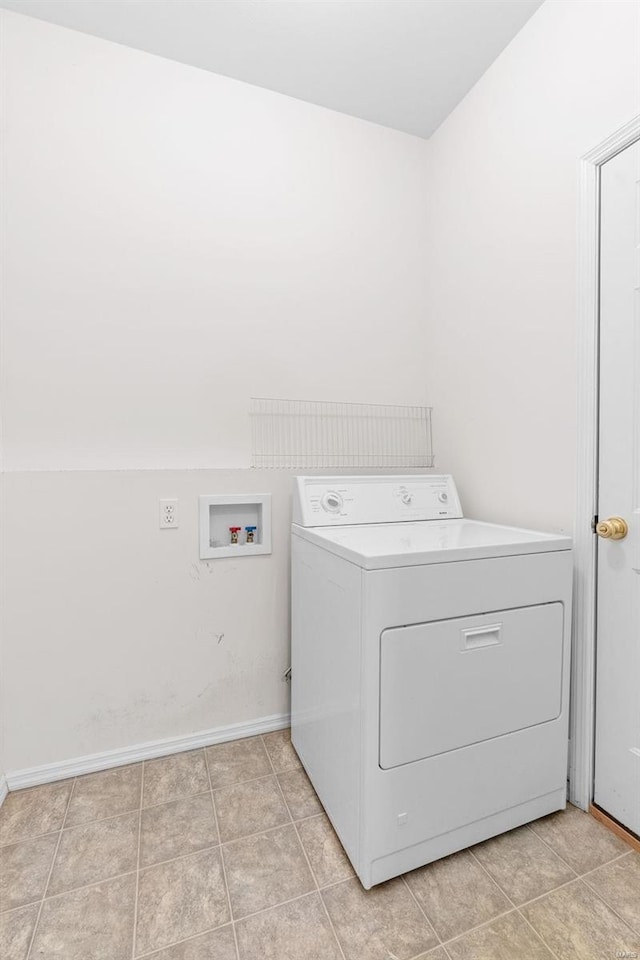 clothes washing area with washer / clothes dryer