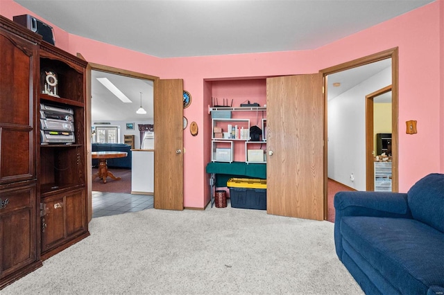 sitting room with light colored carpet