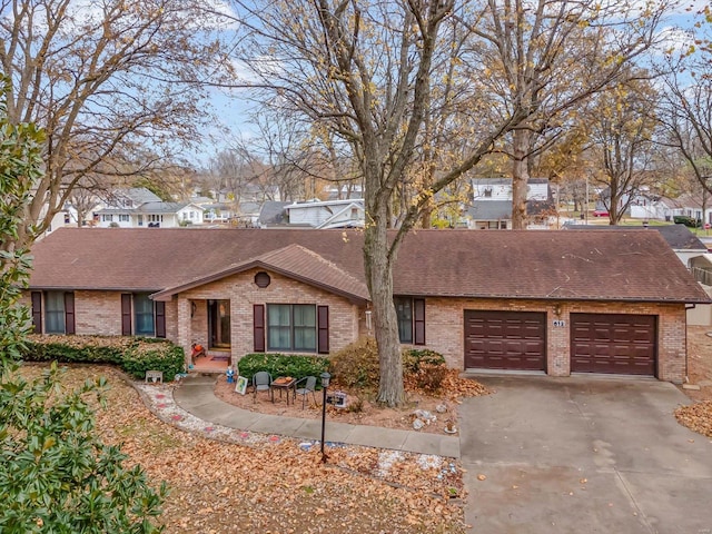 ranch-style home with a garage