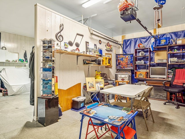 interior space featuring wood walls