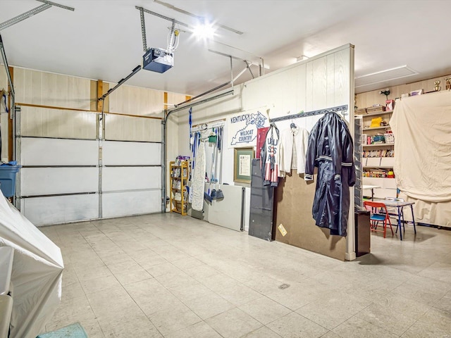 garage featuring a garage door opener