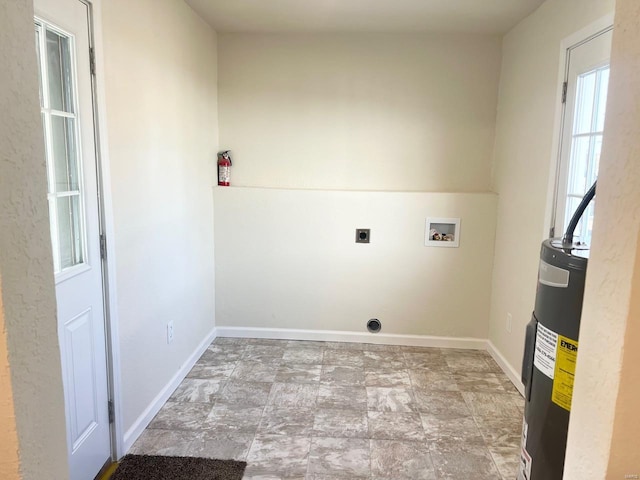 laundry room with hookup for an electric dryer, hookup for a washing machine, and electric water heater