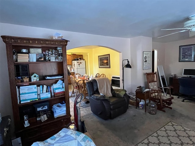 living room featuring ceiling fan