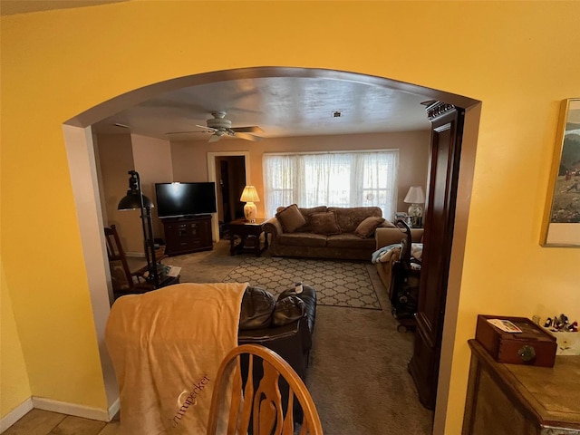 living room with ceiling fan