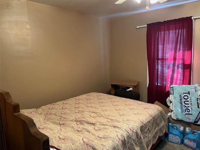 bedroom featuring ceiling fan and carpet flooring