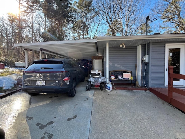 view of vehicle parking featuring a carport