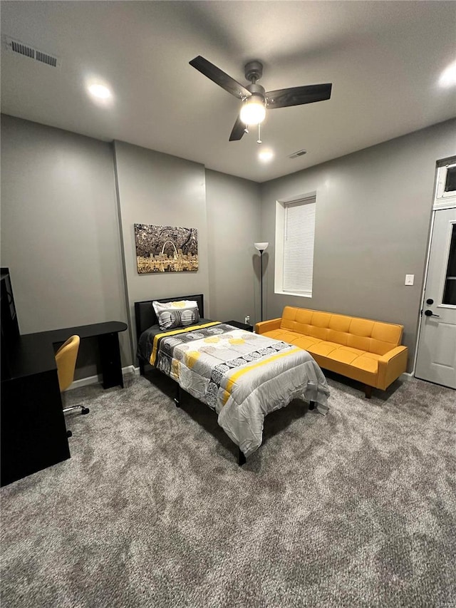 carpeted bedroom featuring ceiling fan