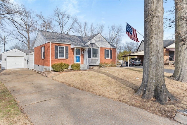 view of front of house with a carport, a garage, and an outdoor structure