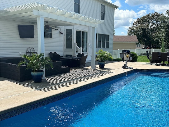 view of pool featuring grilling area, a pergola, a patio area, and outdoor lounge area