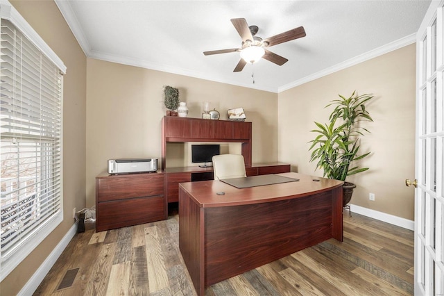 office space with dark wood-type flooring and ornamental molding