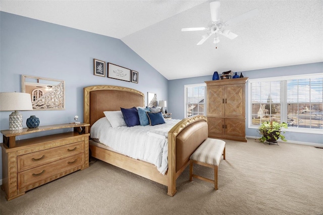 carpeted bedroom with lofted ceiling and ceiling fan