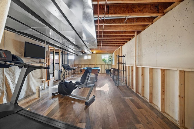 workout room with hardwood / wood-style flooring