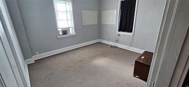 unfurnished room featuring carpet flooring