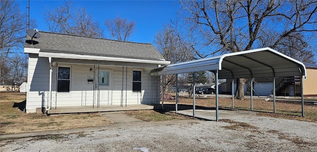 bungalow with a carport and a porch