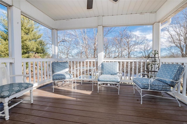 sunroom / solarium with ceiling fan and a wealth of natural light