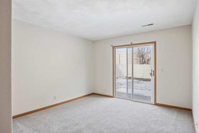 view of carpeted spare room