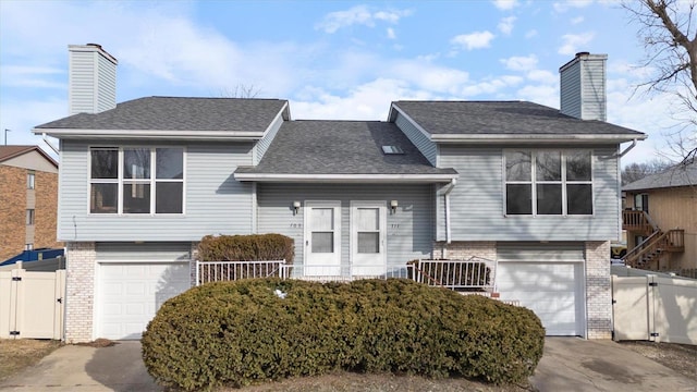 split level home featuring a garage