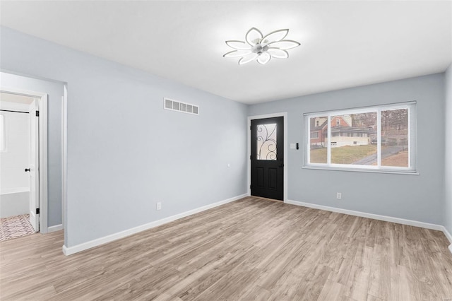 foyer entrance featuring light hardwood / wood-style flooring