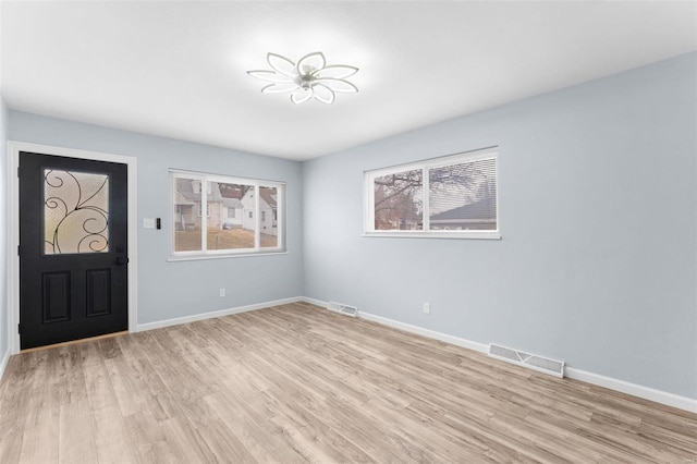 foyer entrance featuring light hardwood / wood-style flooring