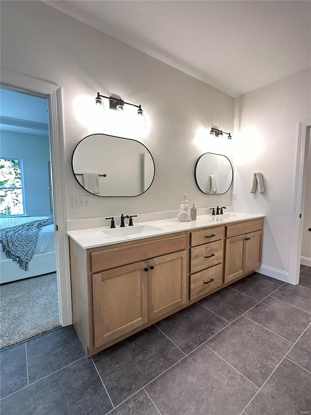 bathroom featuring tile patterned floors and vanity