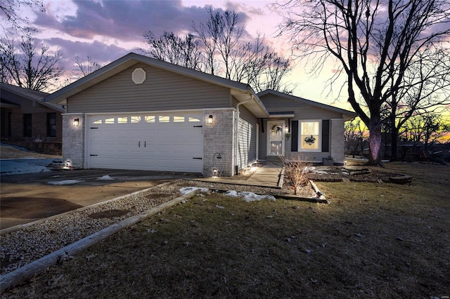 single story home with a garage