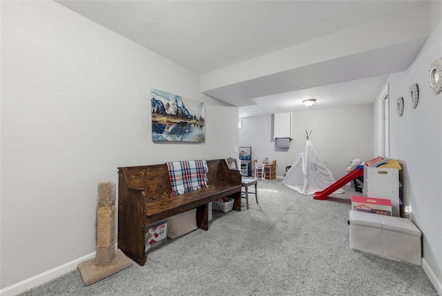 recreation room featuring carpet flooring