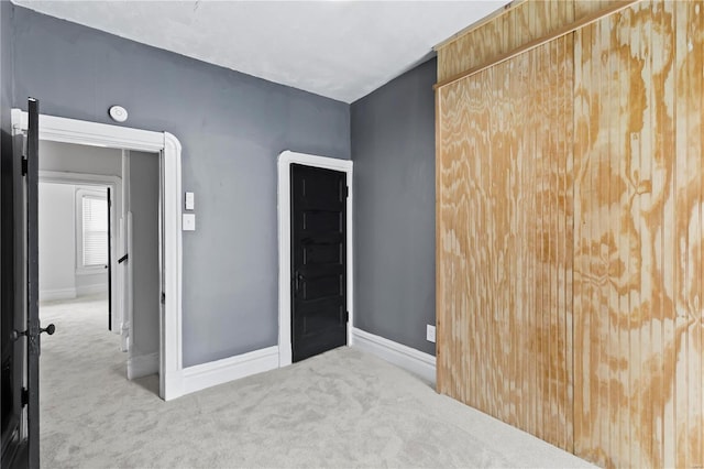 bedroom featuring light colored carpet