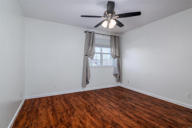 spare room with wood-type flooring and ceiling fan