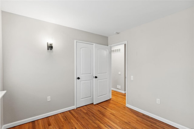 unfurnished bedroom featuring light hardwood / wood-style flooring