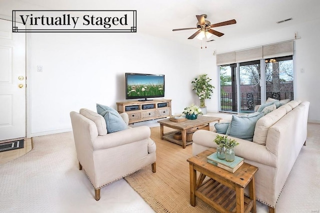 living room featuring ceiling fan