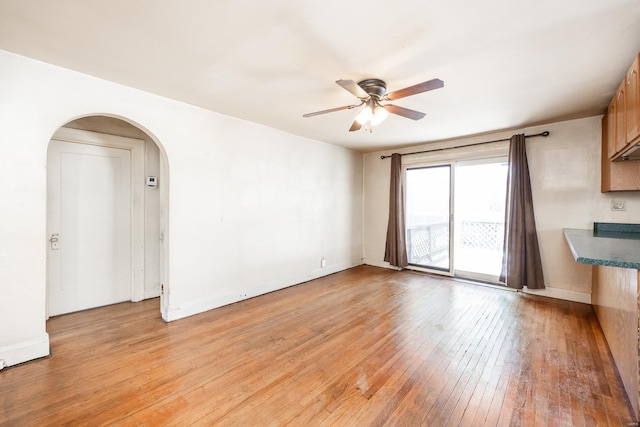 interior space with ceiling fan and light hardwood / wood-style floors