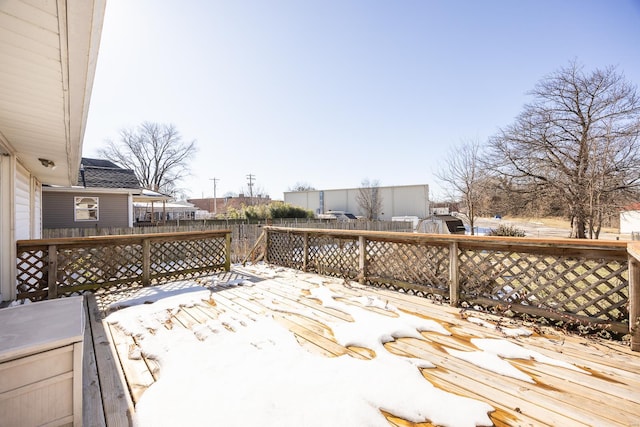 view of snow covered deck