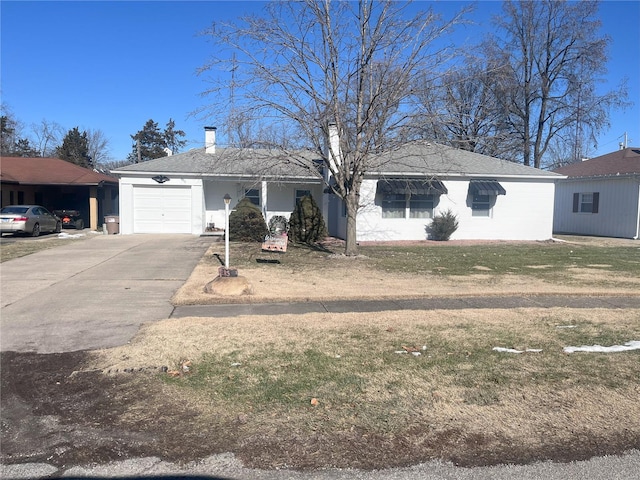 single story home featuring a garage and a front yard