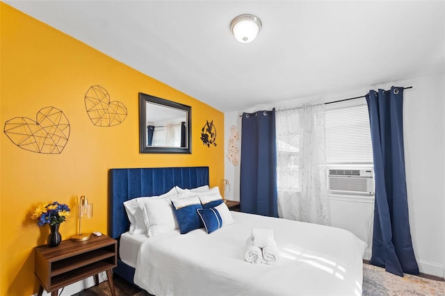 bedroom featuring vaulted ceiling and cooling unit