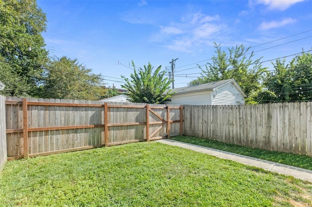 view of yard with a fenced backyard