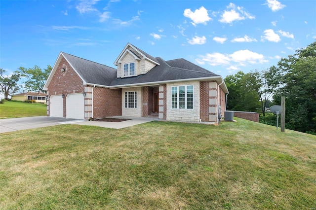 view of front of home featuring a garage, a front lawn, and central air condition unit