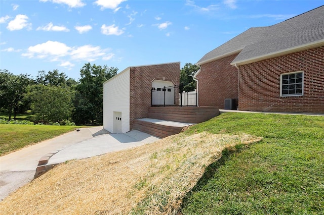 view of home's exterior featuring a lawn