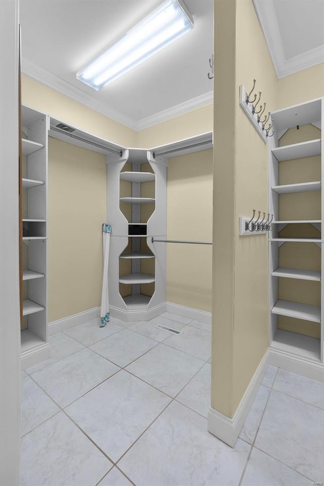 spacious closet featuring tile patterned floors