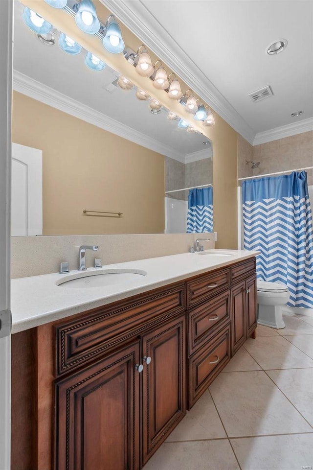 bathroom with tile patterned flooring, vanity, toilet, crown molding, and a shower with curtain