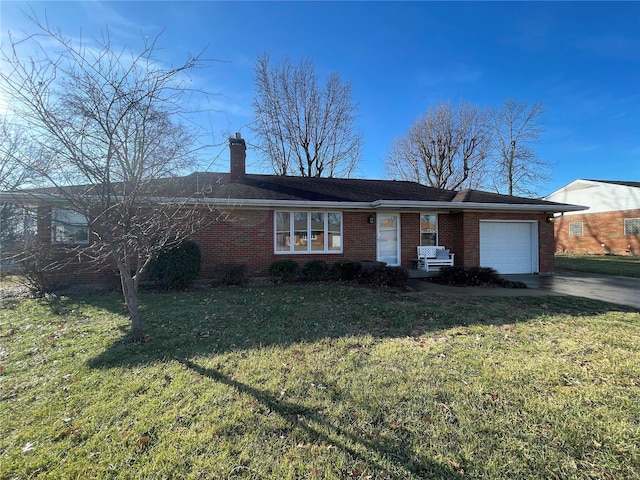 single story home featuring a garage and a front yard