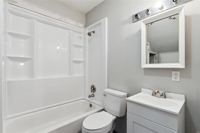 bathroom with tub / shower combination, vanity, and toilet