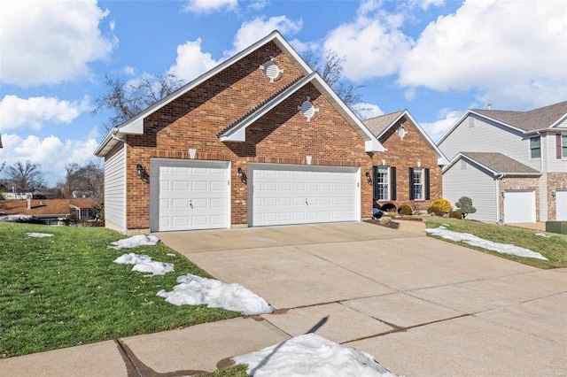 view of property featuring a garage and a front yard