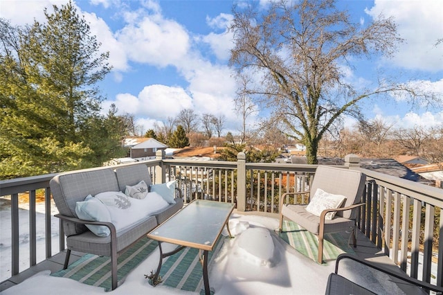 wooden deck featuring outdoor lounge area