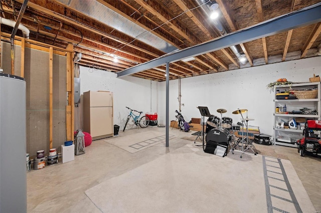 basement with white fridge and refrigerator