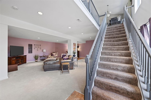 staircase with carpet