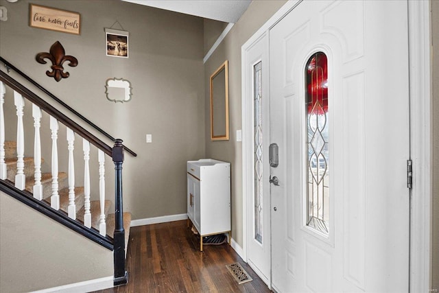 entrance foyer with dark hardwood / wood-style flooring